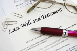 Last Will and Testament document for Will registration in UAE with pen and glasses